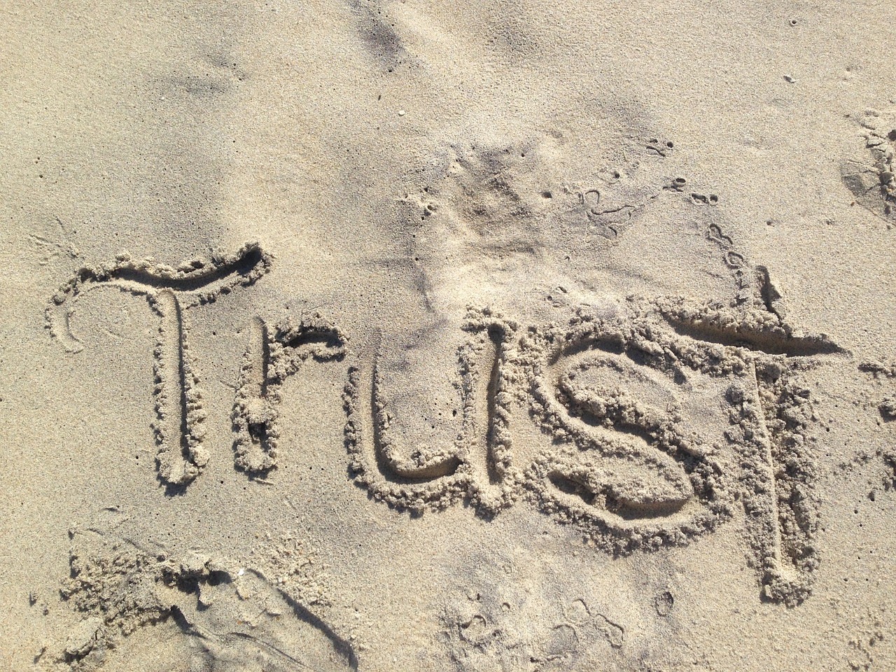 Trust in Sand geschrieben